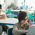 students using devices following open education standards