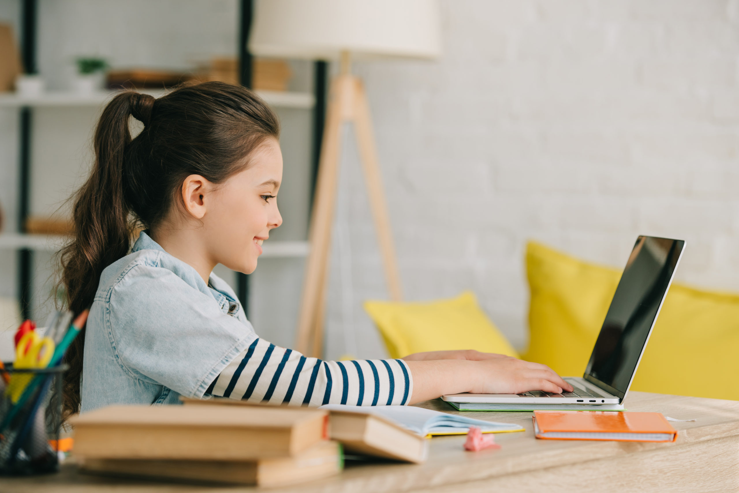 featured image of girl using a computer with student data privacy protected