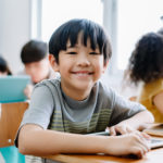 featured image of students in classroom using laptop to take common core assessments